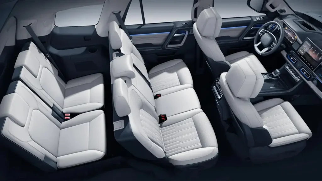Interior of the BAIC BJ60 with three rows of white leather seats.