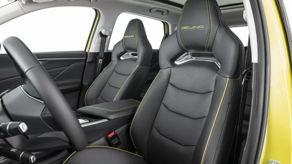 Interior of BEIJING X55 II with black seats and yellow stitching