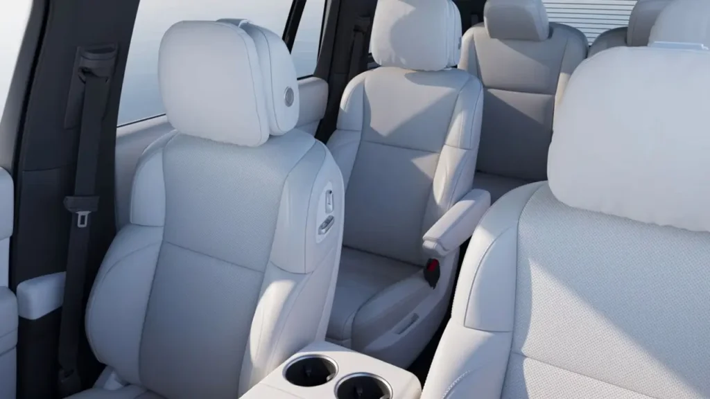 "Luxury in Chinese cars: white leather seats in the spacious third-row interior of a premium electric SUV."