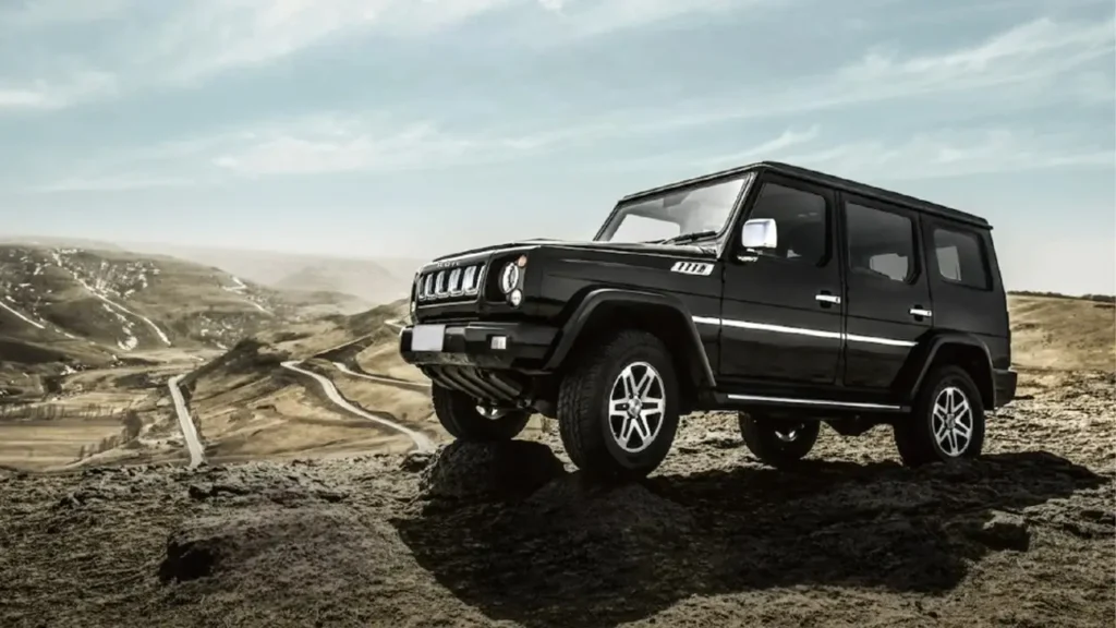 BAIC BJ80 SUV climbing a rocky terrain, demonstrating its off-road capabilities in a mountainous landscape.