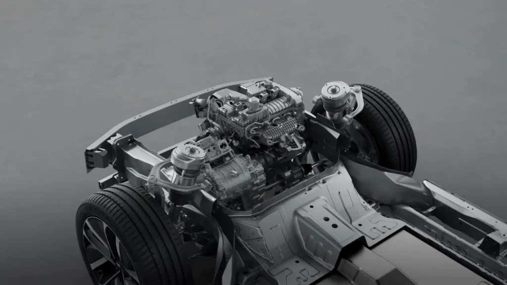 "Engineering behind Chinese cars: exposed platform with hybrid drive components and front suspension system."