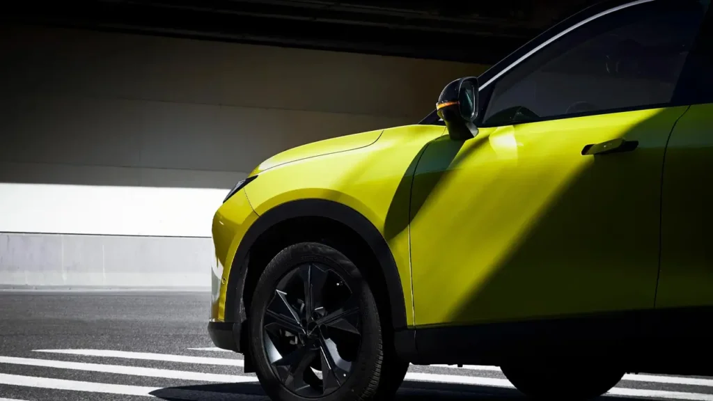 Close-up of the front part of BEIJING X55 II on an urban street background
