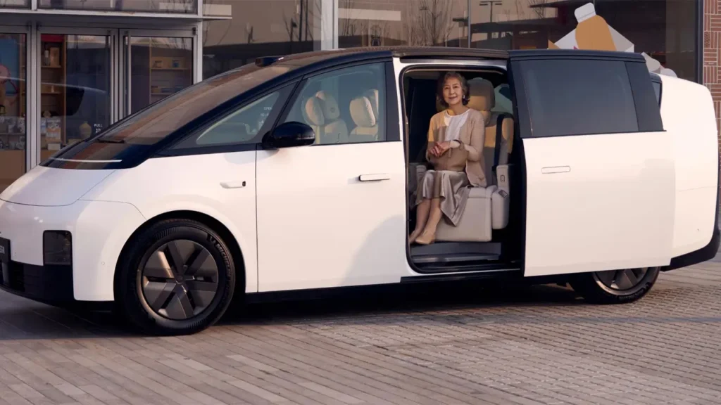 Elderly woman sitting comfortably in Li MEGA electric minivan
